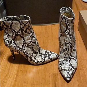 Snakeskin booties. Excellent condition